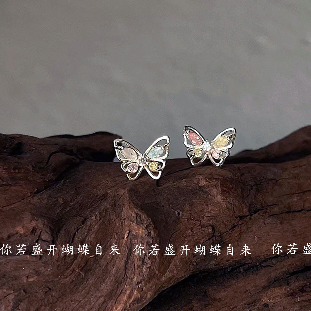 Venta al por mayor Zirconia mariposa pendientes de aleación